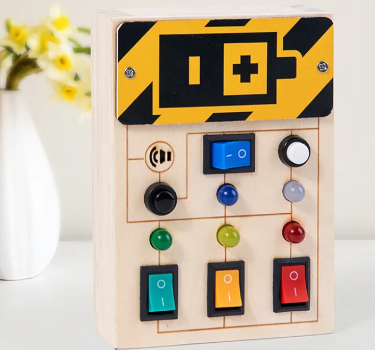 Tablero Montessori de Interruptores de Luz y Sonido para la Exploración Sensorial en Niños